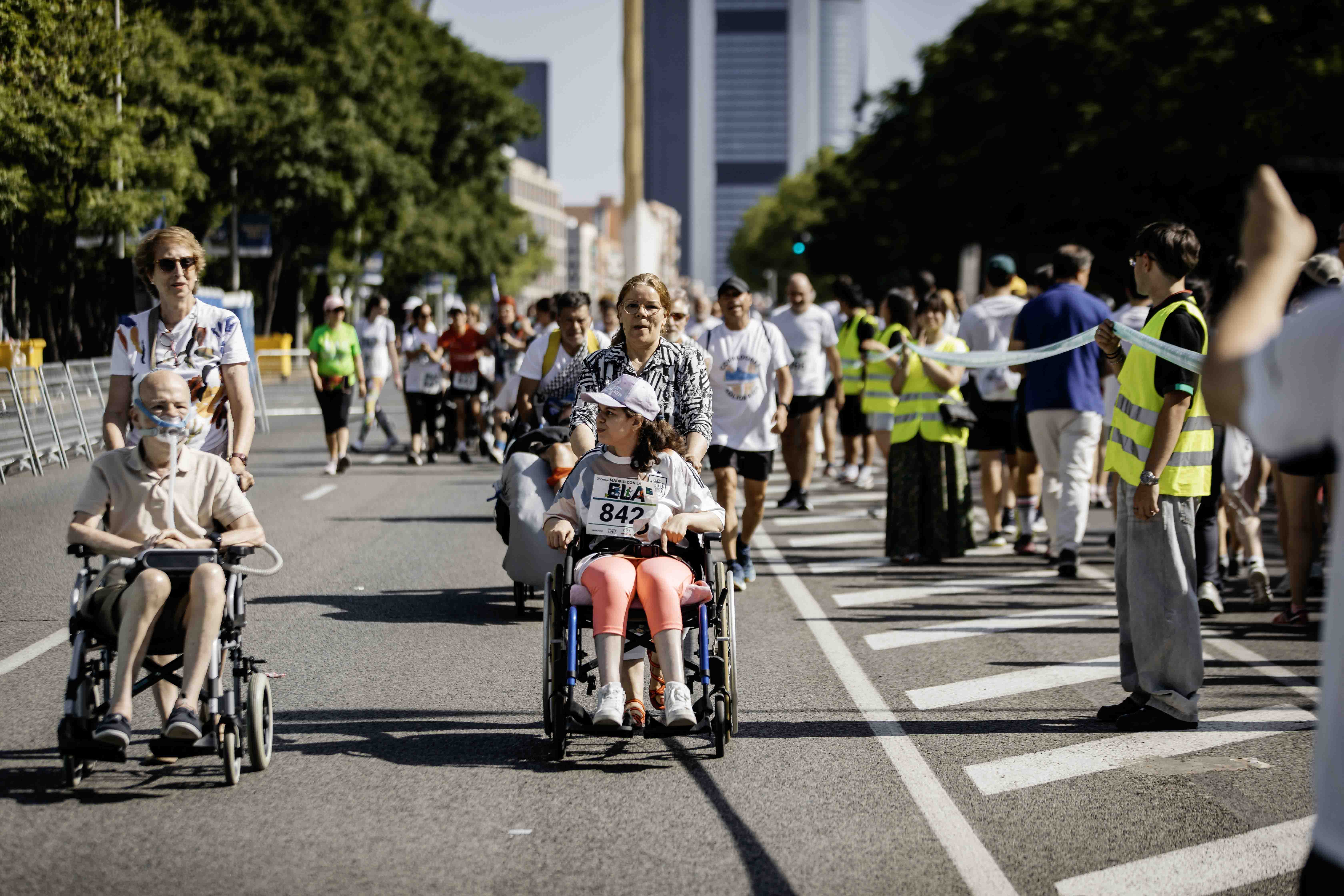 Las mejores fotos de la Carrera de la Superación celebara dentro de la Carrera Madrid con la ELA 32