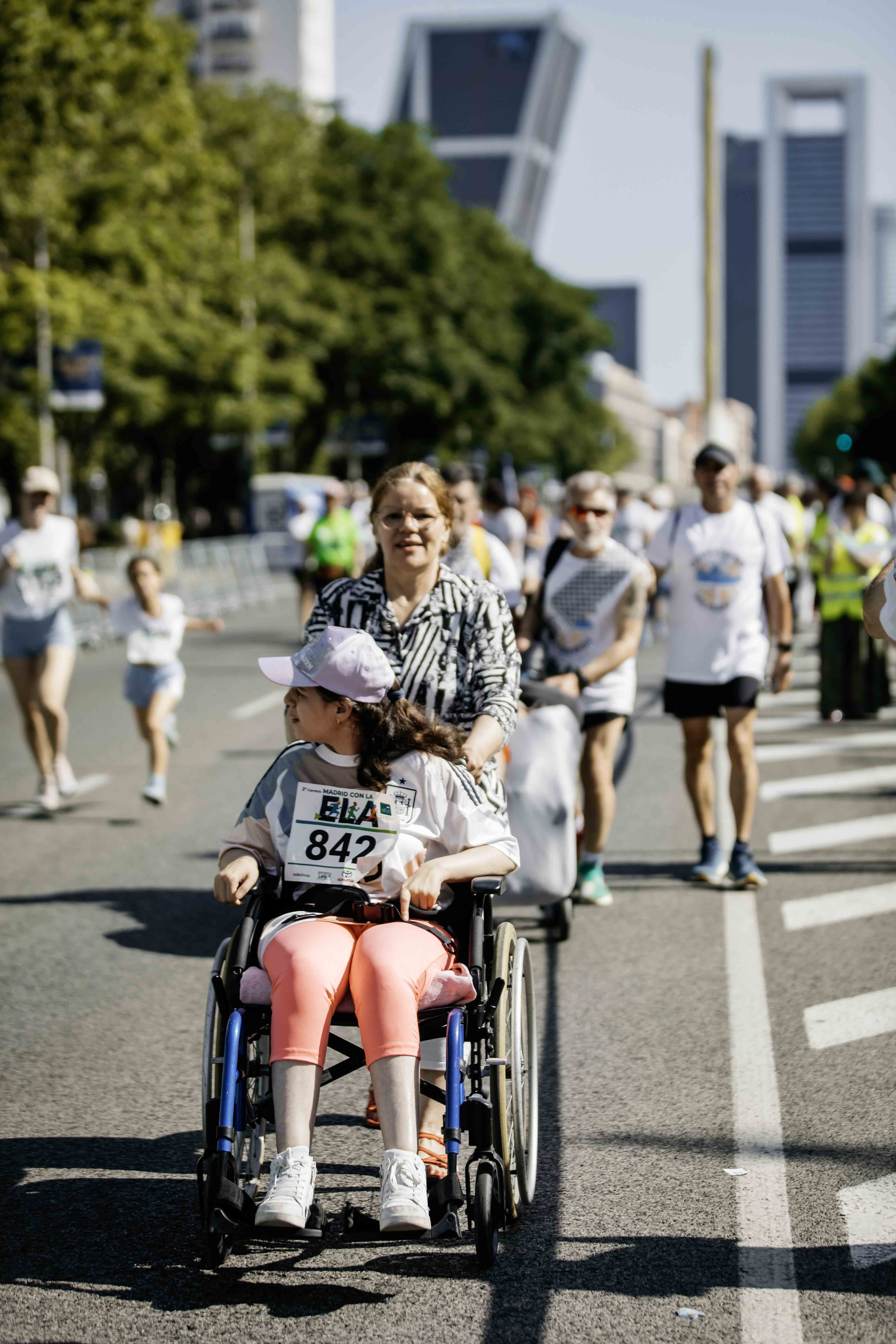Las mejores fotos de la Carrera de la Superación celebara dentro de la Carrera Madrid con la ELA 33