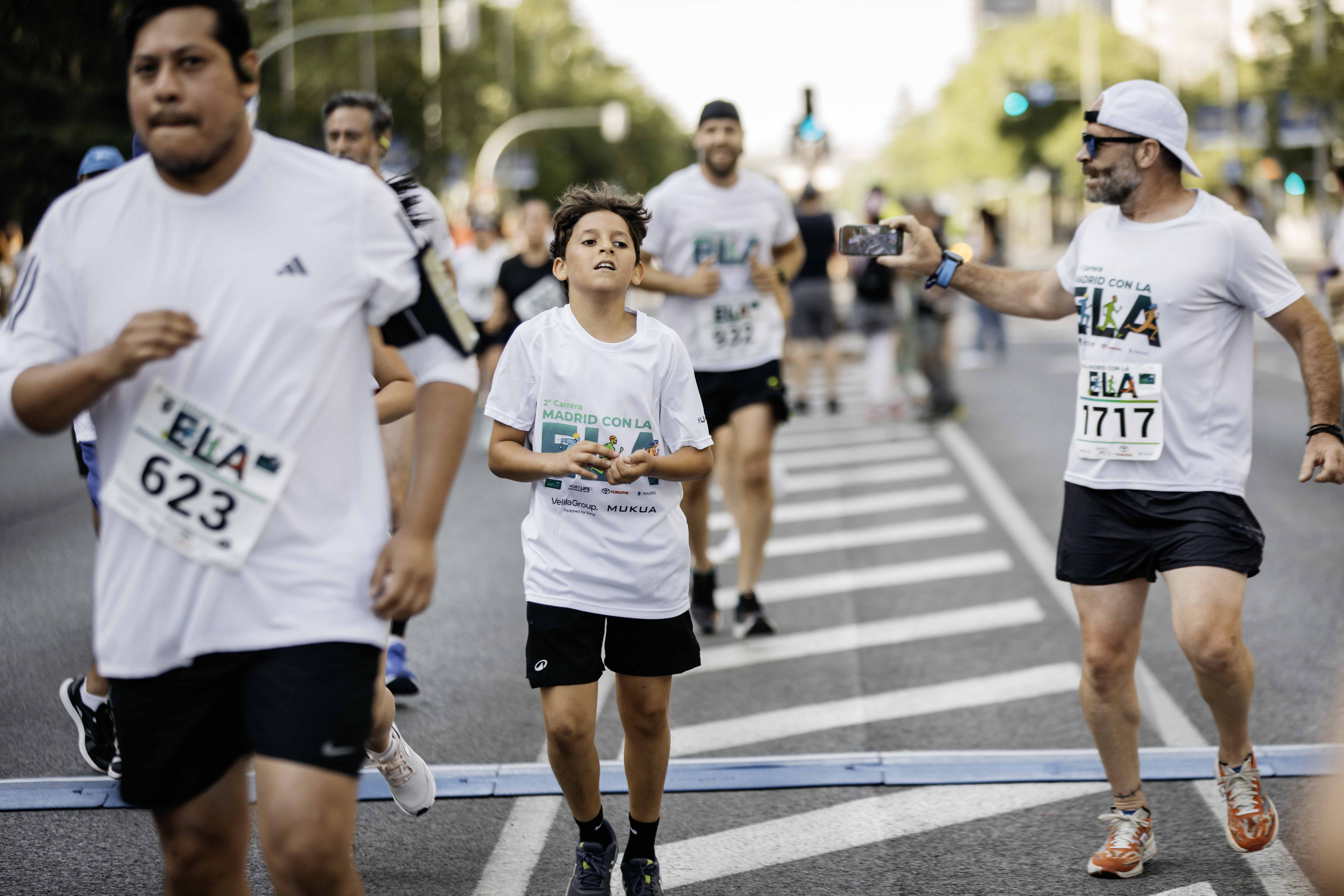 Las mejores fotos de la meta de la Carrera Madrid con la ELA 121