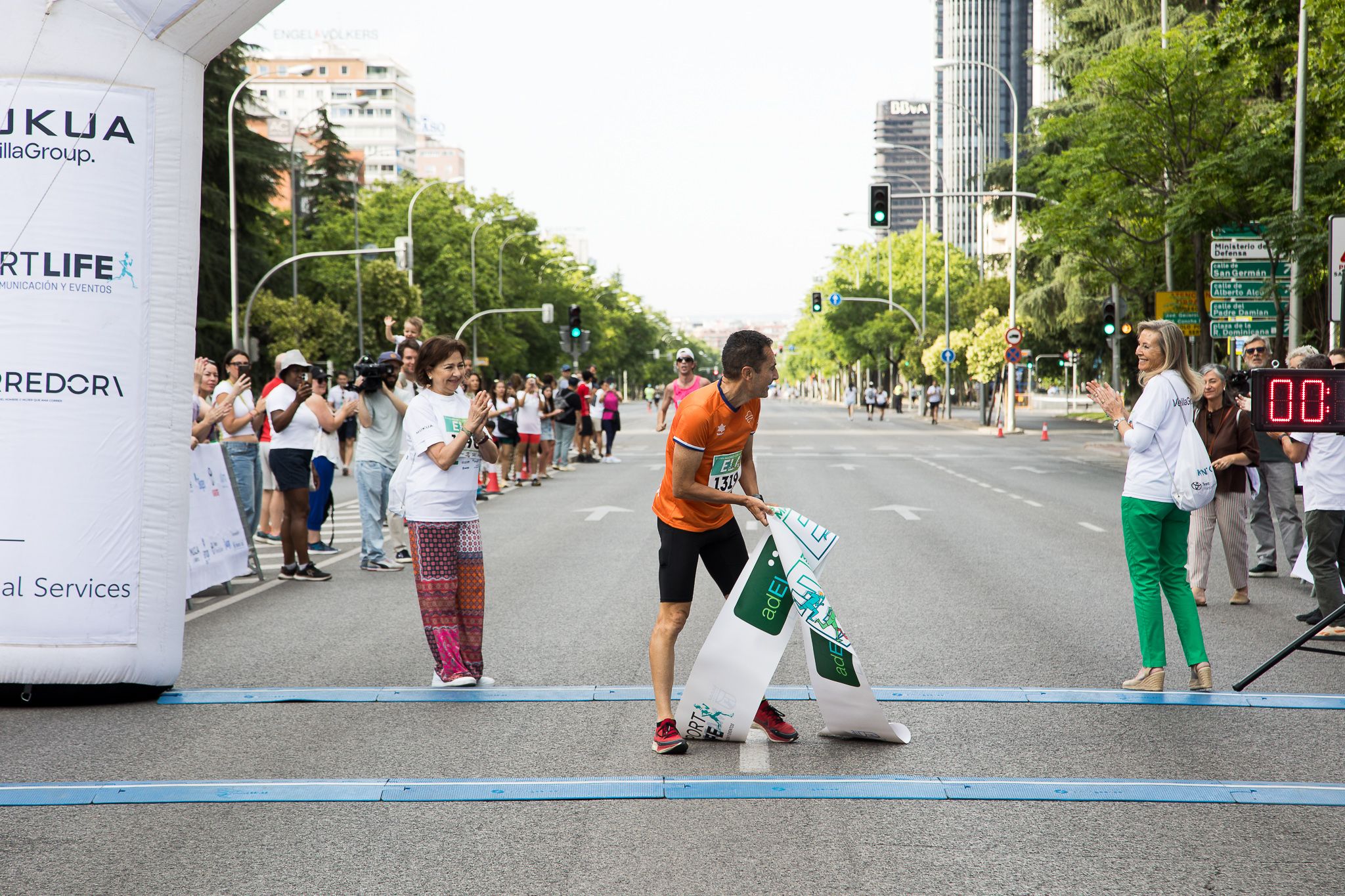 Fotos de la llegada a meta de la III Carrera Madrid con la ELA. LateMiLente 5