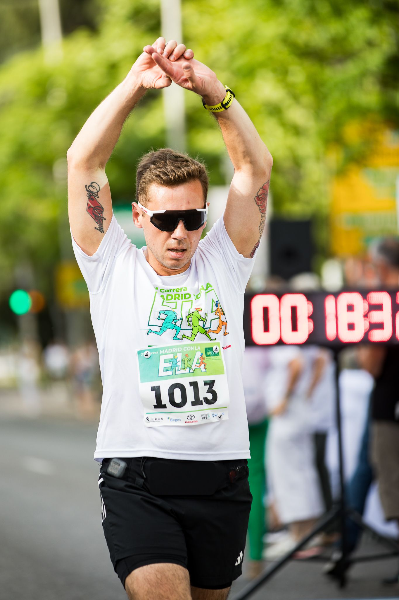 Fotos de la llegada a meta de la III Carrera Madrid con la ELA. LateMiLente 15