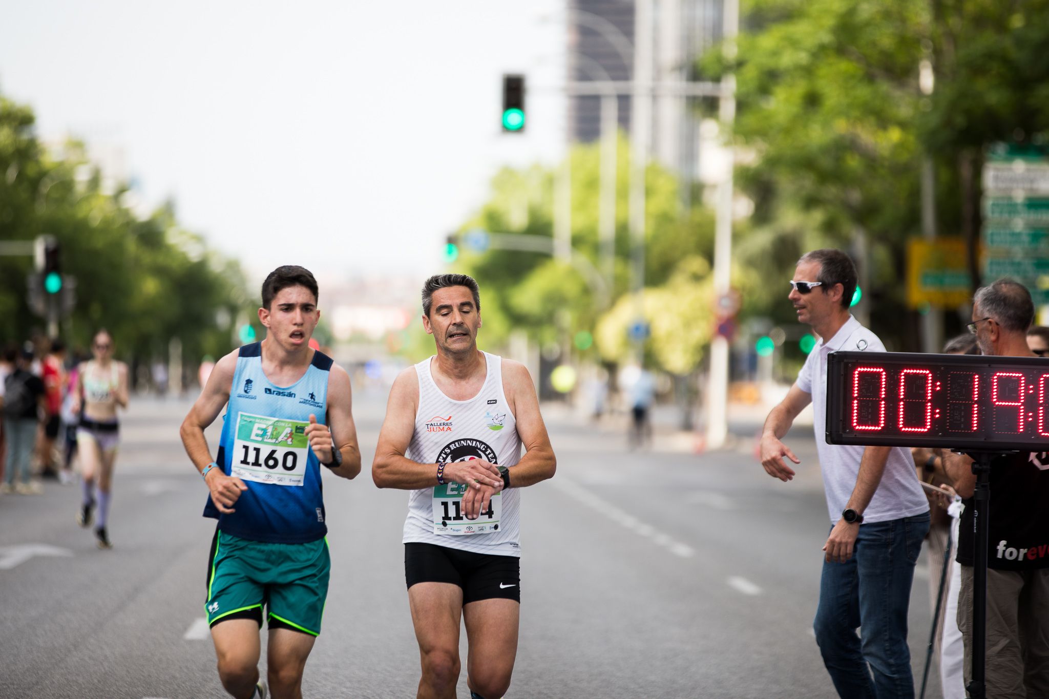 Fotos de la llegada a meta de la III Carrera Madrid con la ELA. LateMiLente 25