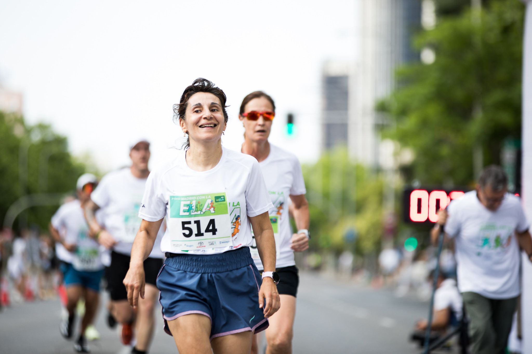 Fotos de la llegada a meta de la III Carrera Madrid con la ELA. LateMiLente 70