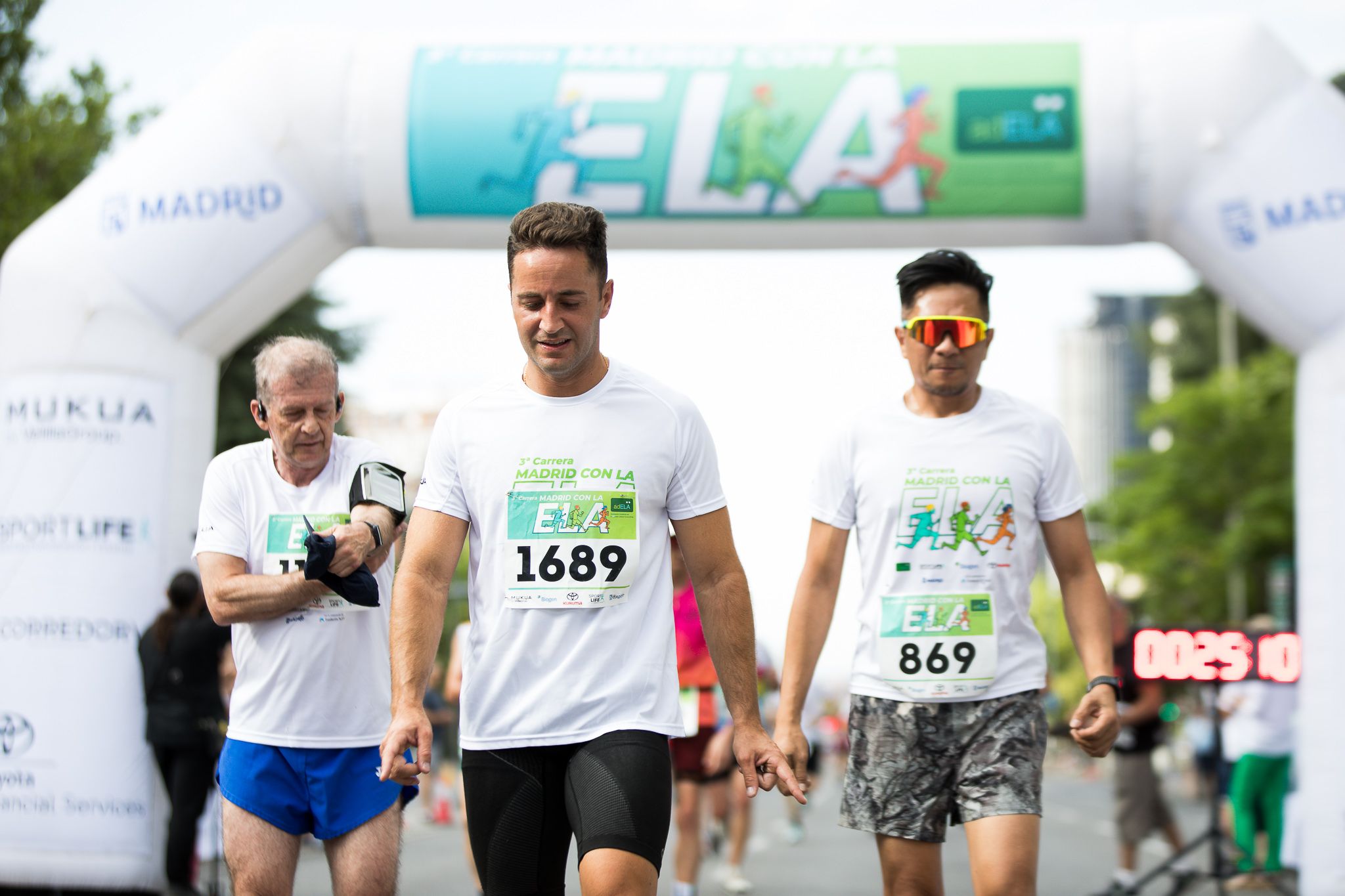 Fotos de la llegada a meta de la III Carrera Madrid con la ELA. LateMiLente 77