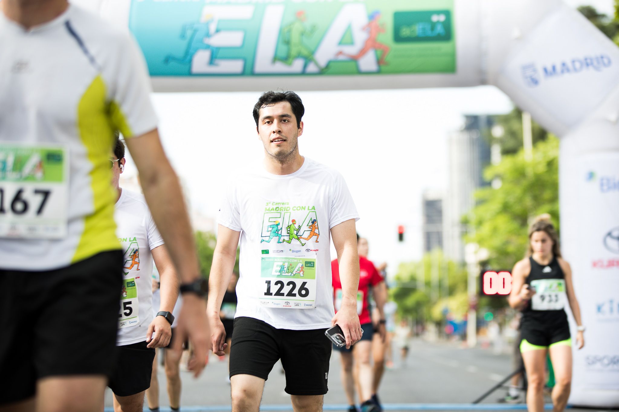 Fotos de la llegada a meta de la III Carrera Madrid con la ELA. LateMiLente 84