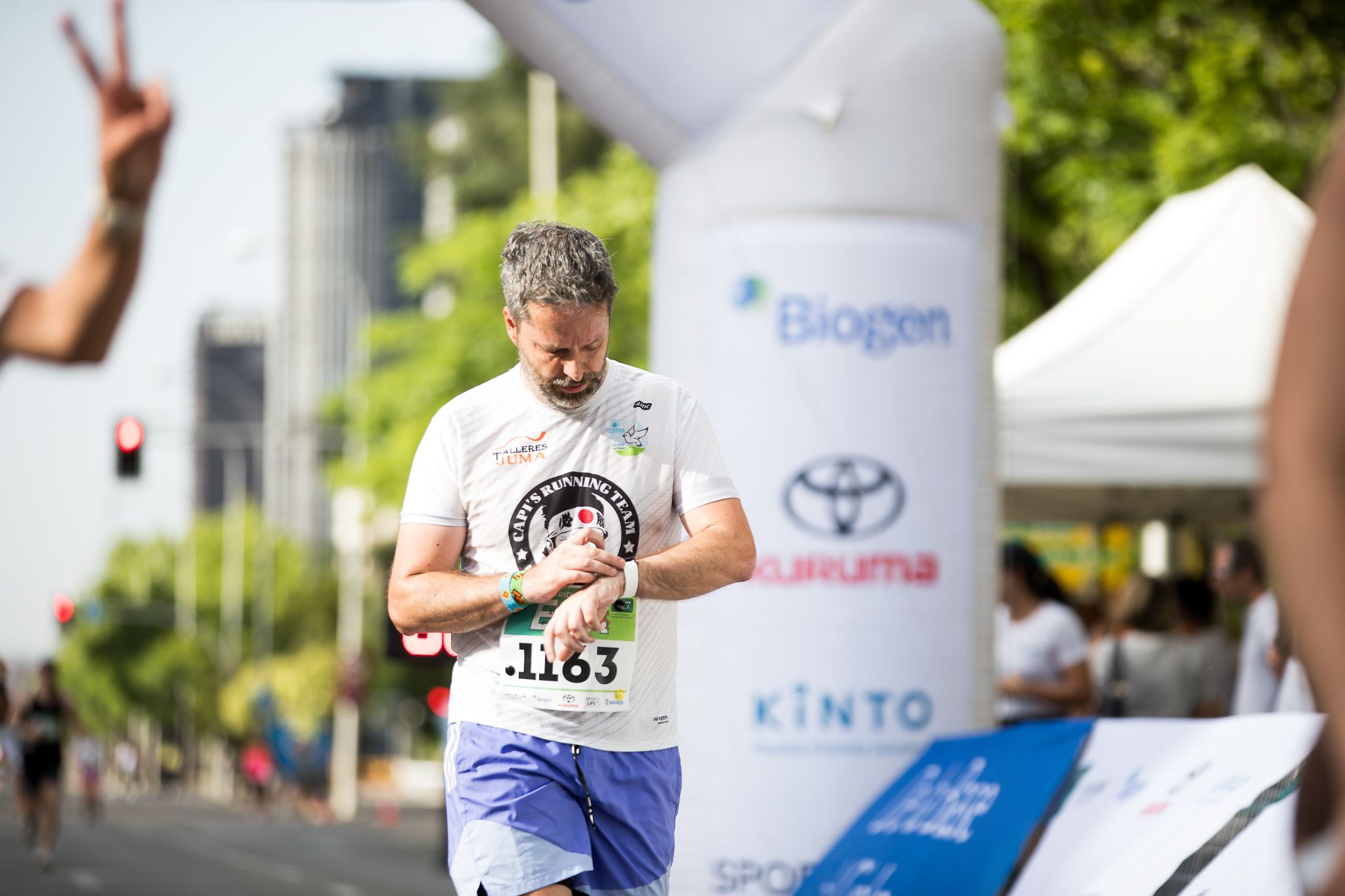 Fotos de la llegada a meta de la III Carrera Madrid con la ELA. LateMiLente 95