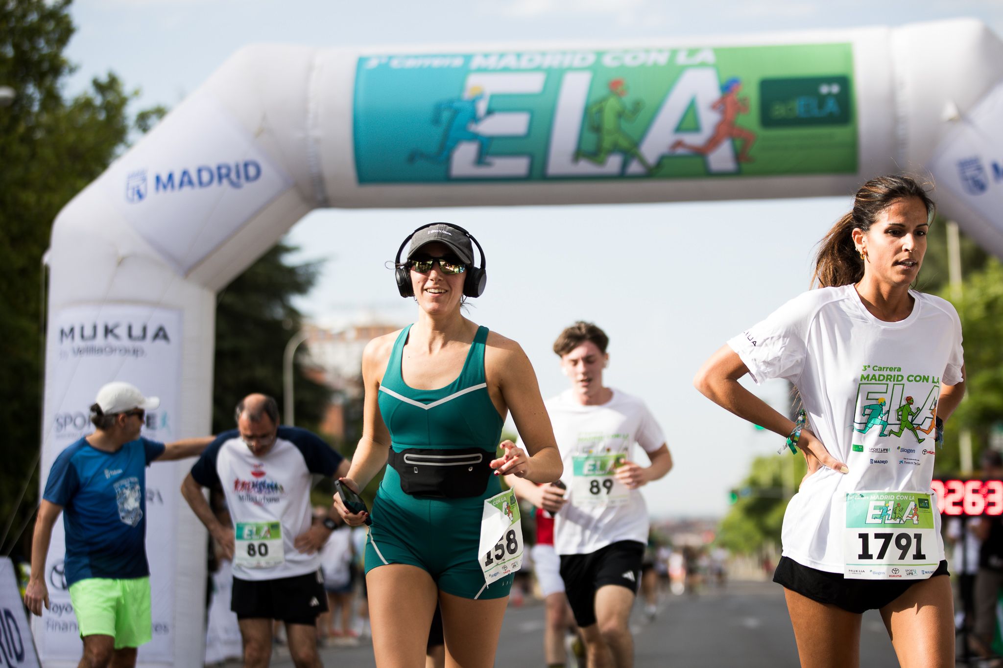 Fotos de la llegada a meta de la III Carrera Madrid con la ELA. LateMiLente 107