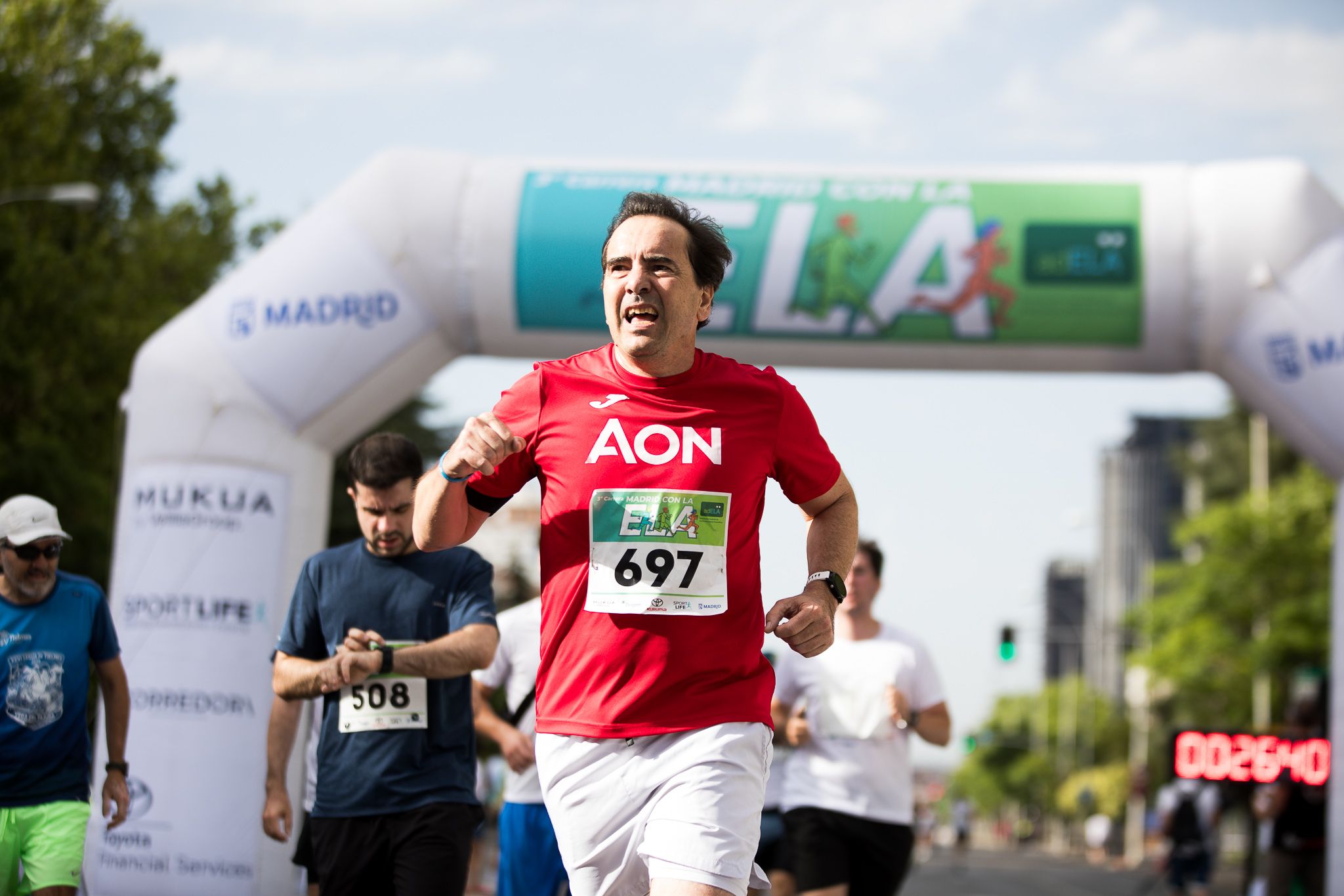 Fotos de la llegada a meta de la III Carrera Madrid con la ELA. LateMiLente 108