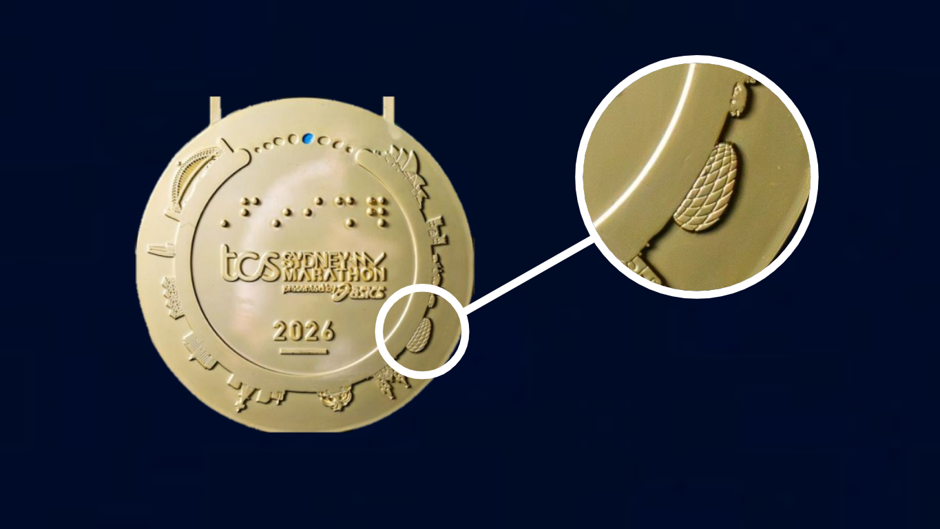 La medalla del Maratón de Syndey 2026 con el estadio del Bayern de Munich.