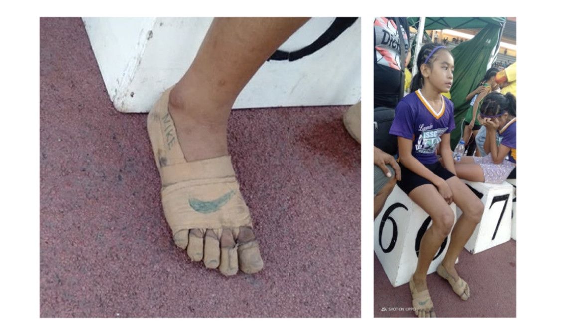 Gana tres oros corriendo sin zapatillas, con los pies vendados y el logo de Nike pintado